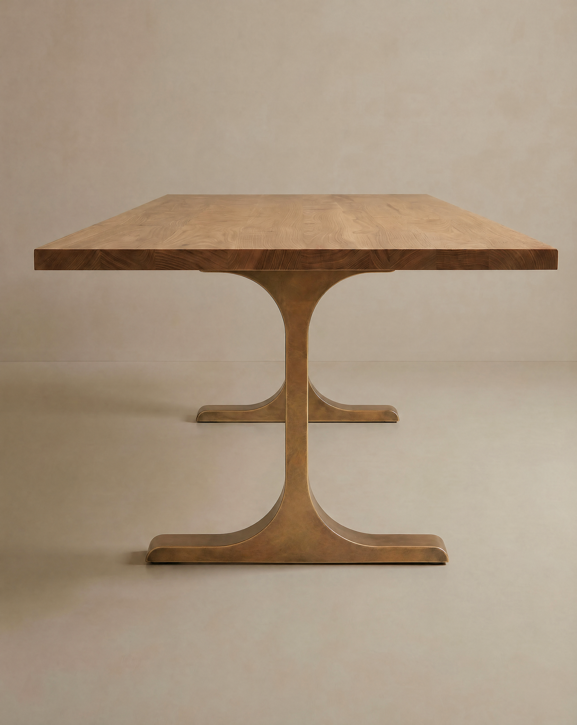 The SOBU Tommaso Dining Table features a rectangular solid wood top with a natural finish and distinctive brass T-shaped metal legs, set against a neutral beige background.