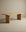 The Tommaso Dining Table by SOBU features a minimalist European oak design with a rectangular top and two wide wood legs, shown against a neutral beige background.