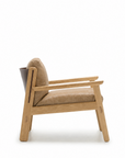 Side view of the Wren Lounge Chair | Leather by Wooden Stories, featuring a light wood frame and tan cushioned seat and backrest upholstered in Sørensen Harness leather, photographed against a plain white background.