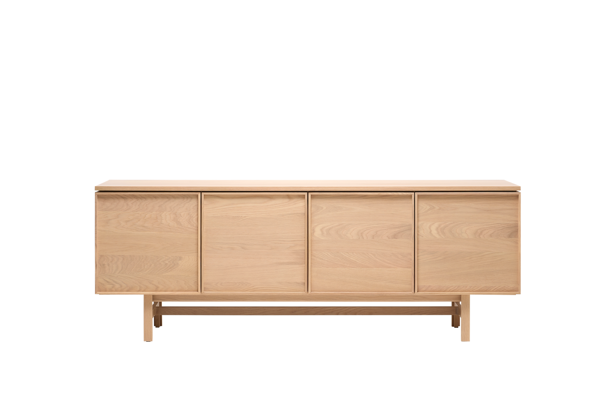 The Wooden Stories Yorke Sideboard features a minimalist Scandinavian-inspired design with four flat cabinet doors, crafted from light solid oak, and is shown against a plain white background.