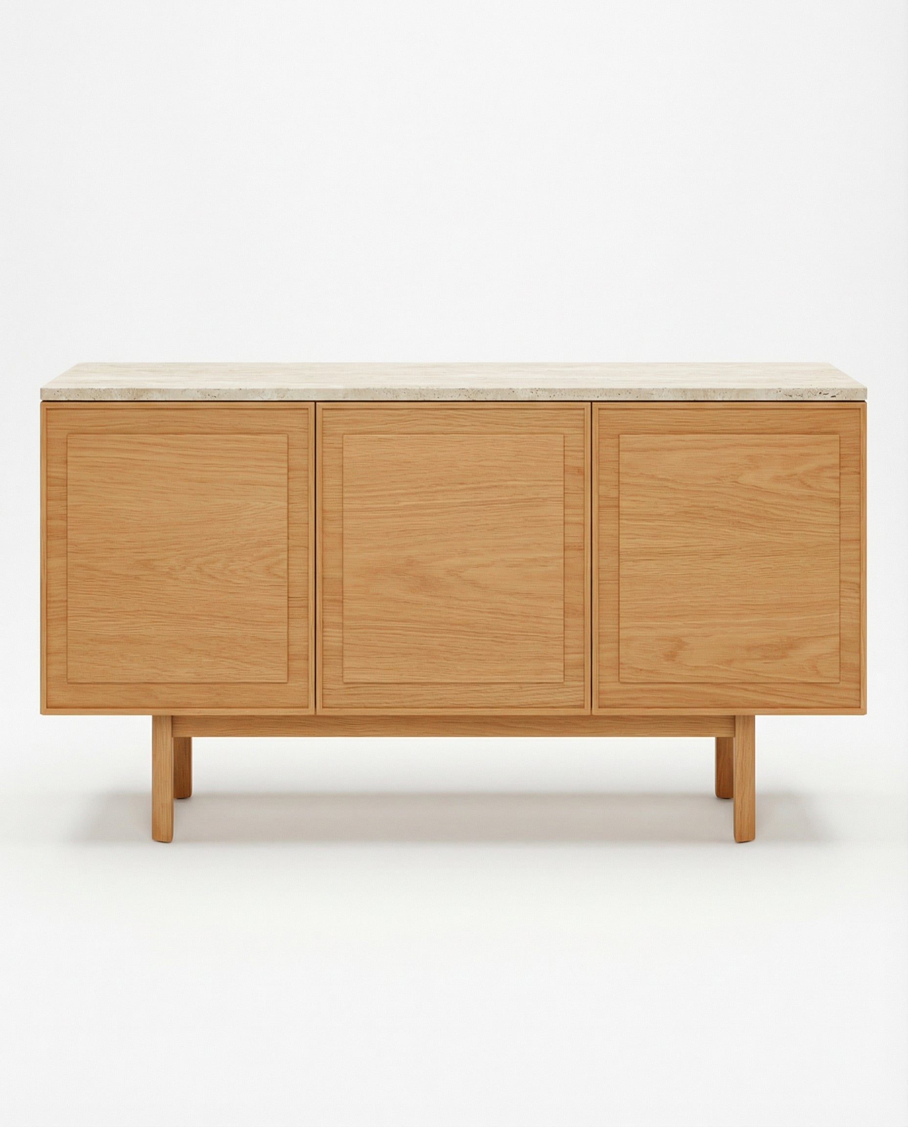 The Wooden Stories Yorke Sideboard with Stone Top showcases Danish-inspired lines, three spacious flat-panel doors, four short legs, and a light stone surface, all presented against a plain white background.