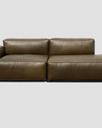 The Wooden Stories Baker Modular Sofa | Leather • M1 is a modern brown leather sectional with a left-arm chaise, showcased against a plain light gray background.