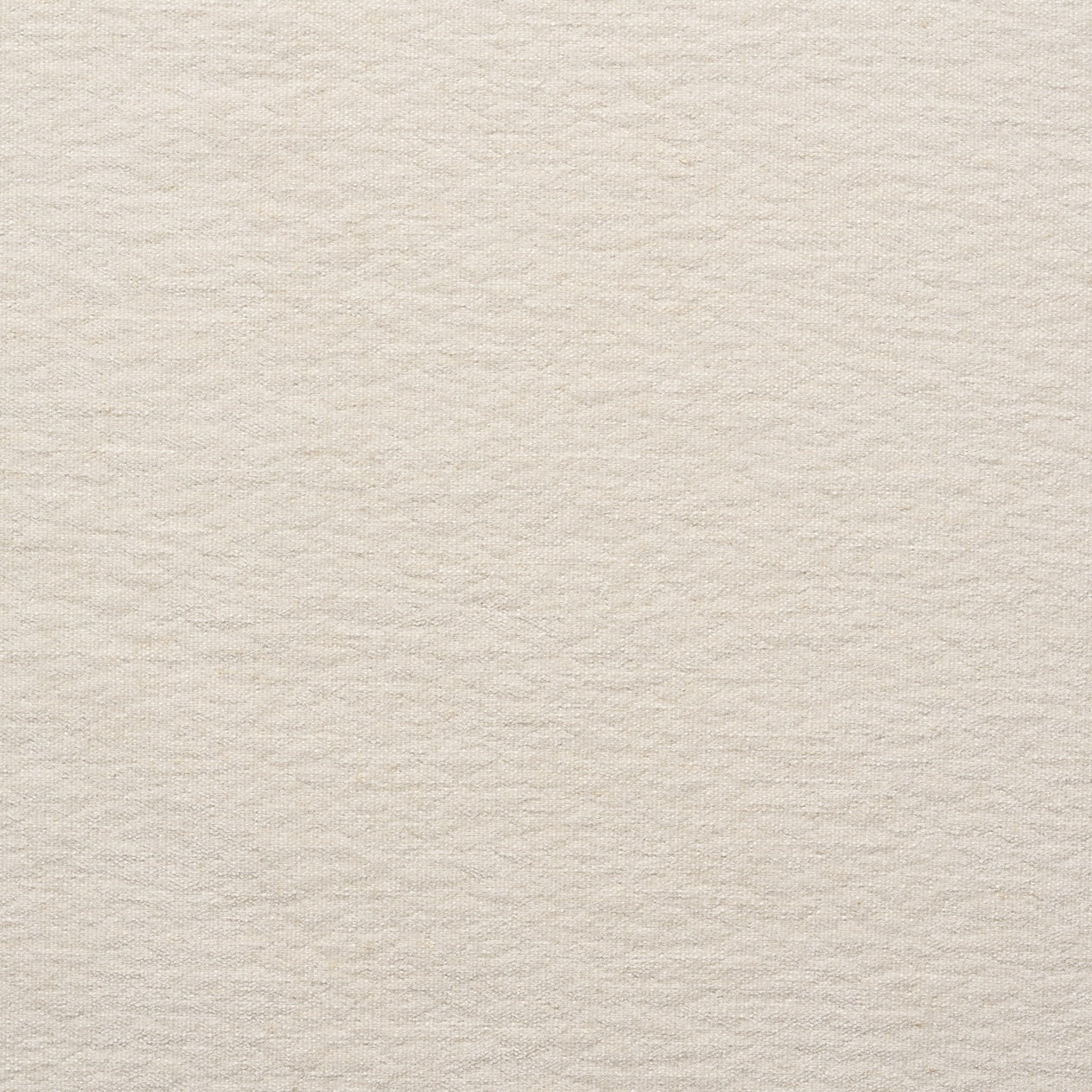A close-up of a textured, off-white surface reveals the subtle irregular patterns featured in Natadora + Tolv Material Swatches, each custom made-to-order for the perfect sample.