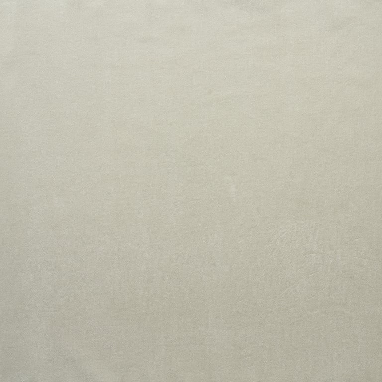 A soft, light beige fabric with subtle creases from Wooden Stories&#39; Fabric + Leather Swatches, available as swatches or custom made-to-order.