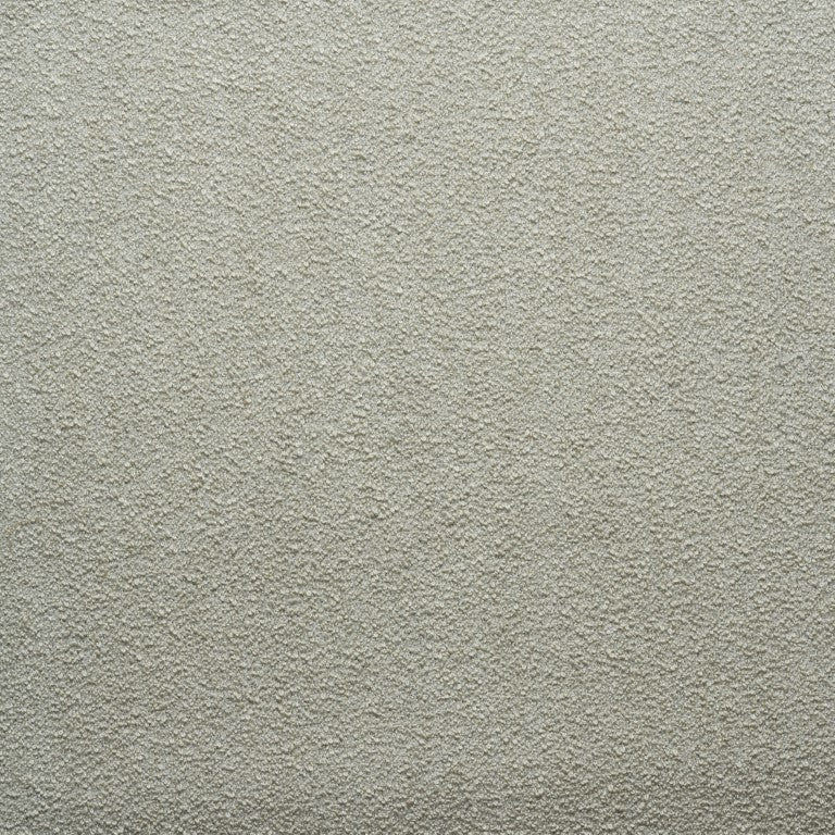 Close-up of a light gray, rough textured wall with a slightly uneven surface—perfect inspiration for custom made-to-order finishes from Wooden Stories&#39; Fabric + Leather Swatches, echoing their distinctive consistency.