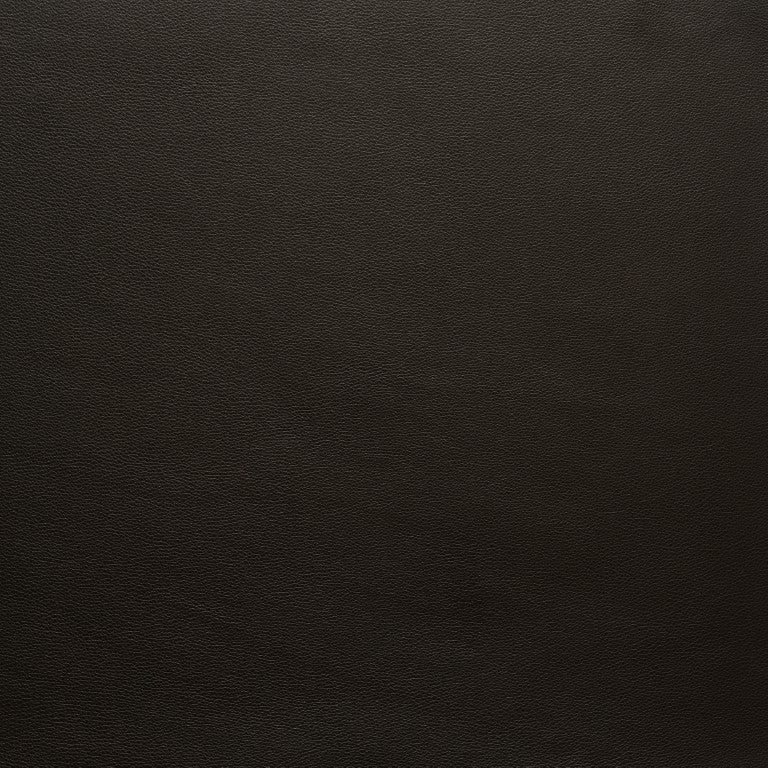 A close-up of dark brown leather from Wooden Stories’ Fabric + Leather Swatches highlights its natural, fine grain texture—ideal for selecting swatches or custom made-to-order items.