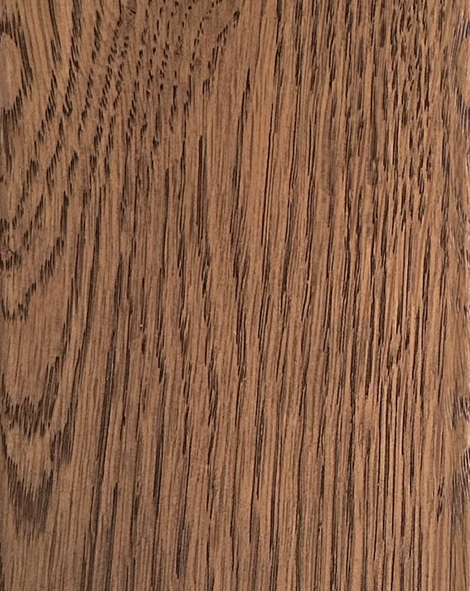 Close-up of a Material Swatches Danish Collection brown wood grain with vertical patterns.