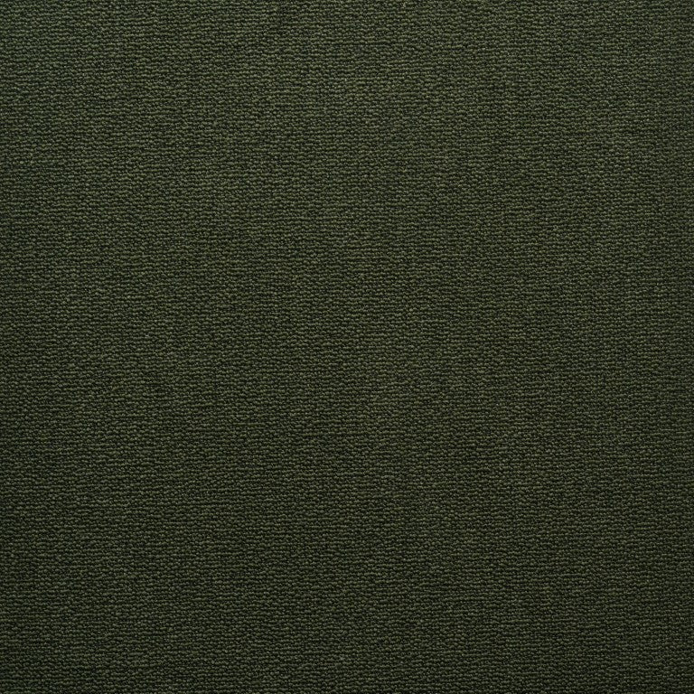 A close-up of a textured dark green surface highlights the subtle, uniform pattern of the Wooden Stories Fabric + Leather Swatches, evoking the collection&#39;s luxurious feel.