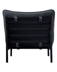 The Morgan Outdoor Chair by Moes is a modern black accent chair shown from the back, featuring a durable Olefin fabric backrest, horizontal support slats, and slender legs with a stainless-steel frame, set against a white background.