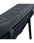 Close-up of the Moes Morgan Outdoor Chair, highlighting its dark gray Olefin cushioned seat and supportive black metal frame with strap detail, focusing on the backrest and durable structure.