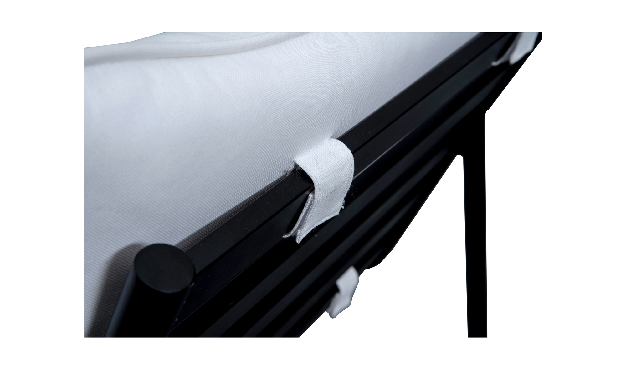 Close-up of the Moes Morgan Outdoor Chair in white, secured to a black metal frame with white fabric straps, highlighting durability reminiscent of olefin fabric.