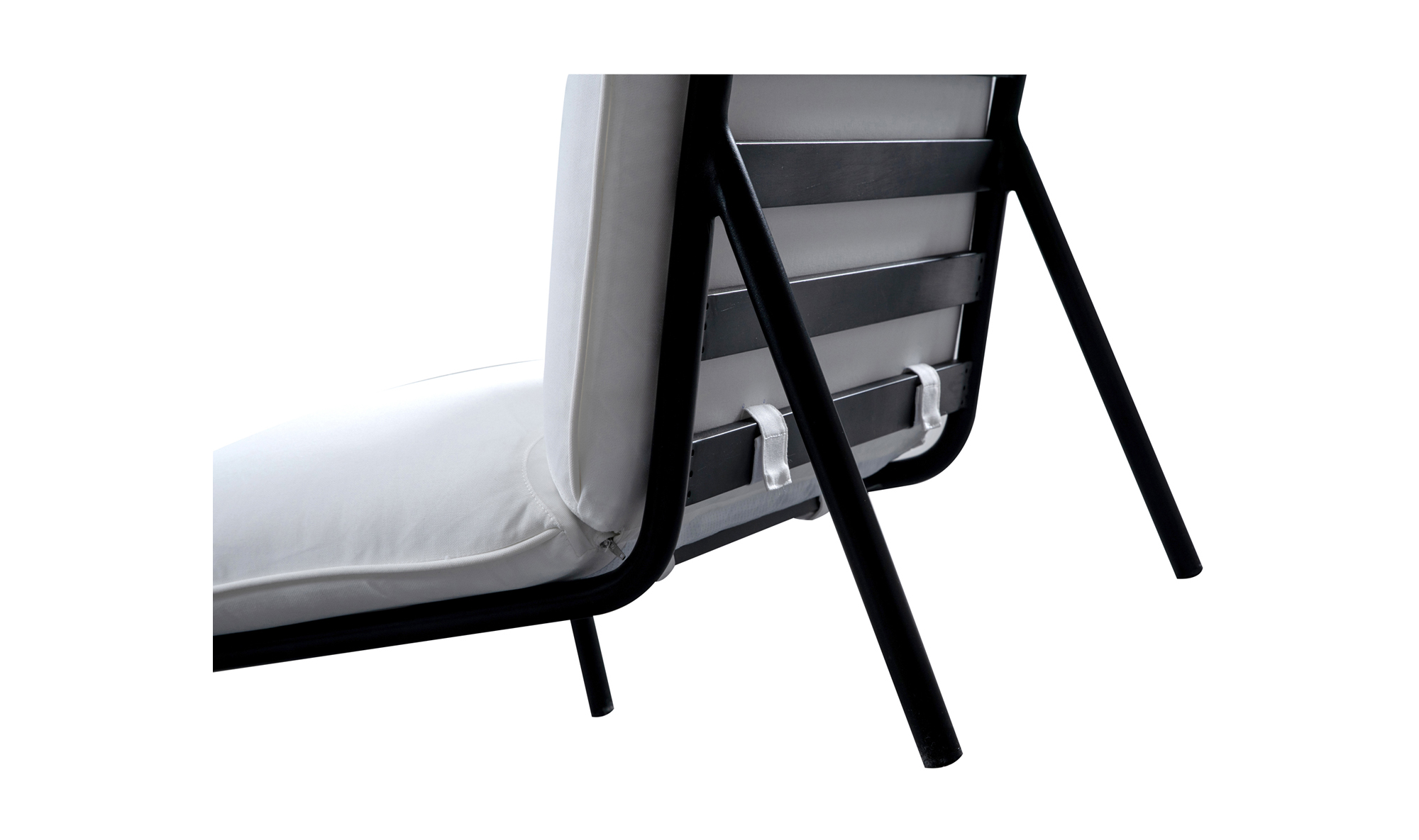 Close-up of the back and legs of the Moes Morgan Outdoor Chair, showcasing its black stainless-steel frame, light Olefin fabric cushion with a securing strap, all set against a plain white background.