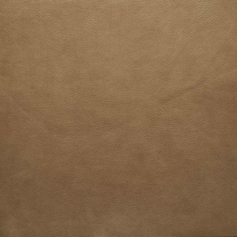 Close-up of light brown leather texture from Wooden Stories&#39; Fabric + Leather Swatches, featuring fine natural grain and subtle creases—ideal for custom made-to-order pieces.