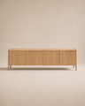 The Wooden Stories Nell Sideboard | Light Oak features four doors, clean lines, and a light natural solid oak finish that embodies Scandinavian minimalism. It is showcased against a beige background.