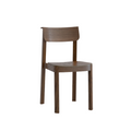 The Noki Dining Chair by Wooden Stories features a contract-grade design with a curved backrest, flat seat, espresso oak finish, and four straight legs, shown against a plain white background.