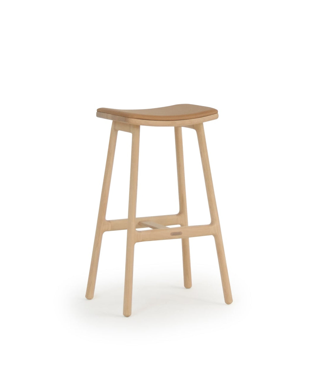 The Odd Counter Stool by Wooden Stories features a light oak frame, four legs with a footrest, and a curved leather seat in classic Danish style—all set against a plain white background.
