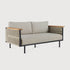 The Ethnicraft Corbey Outdoor Sofa features light beige cushions, a black metal frame, wooden armrests, and rope side detailing—a modern two-seater ideal for your outdoor space, shown here against a white background.
