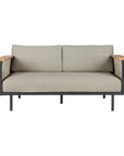 The Corbey Outdoor Sofa by Ethnicraft features light gray cushions, a black metal frame, and wooden armrests—a stylish modern two-seater ideal for outdoor spaces—shown on a plain white background.