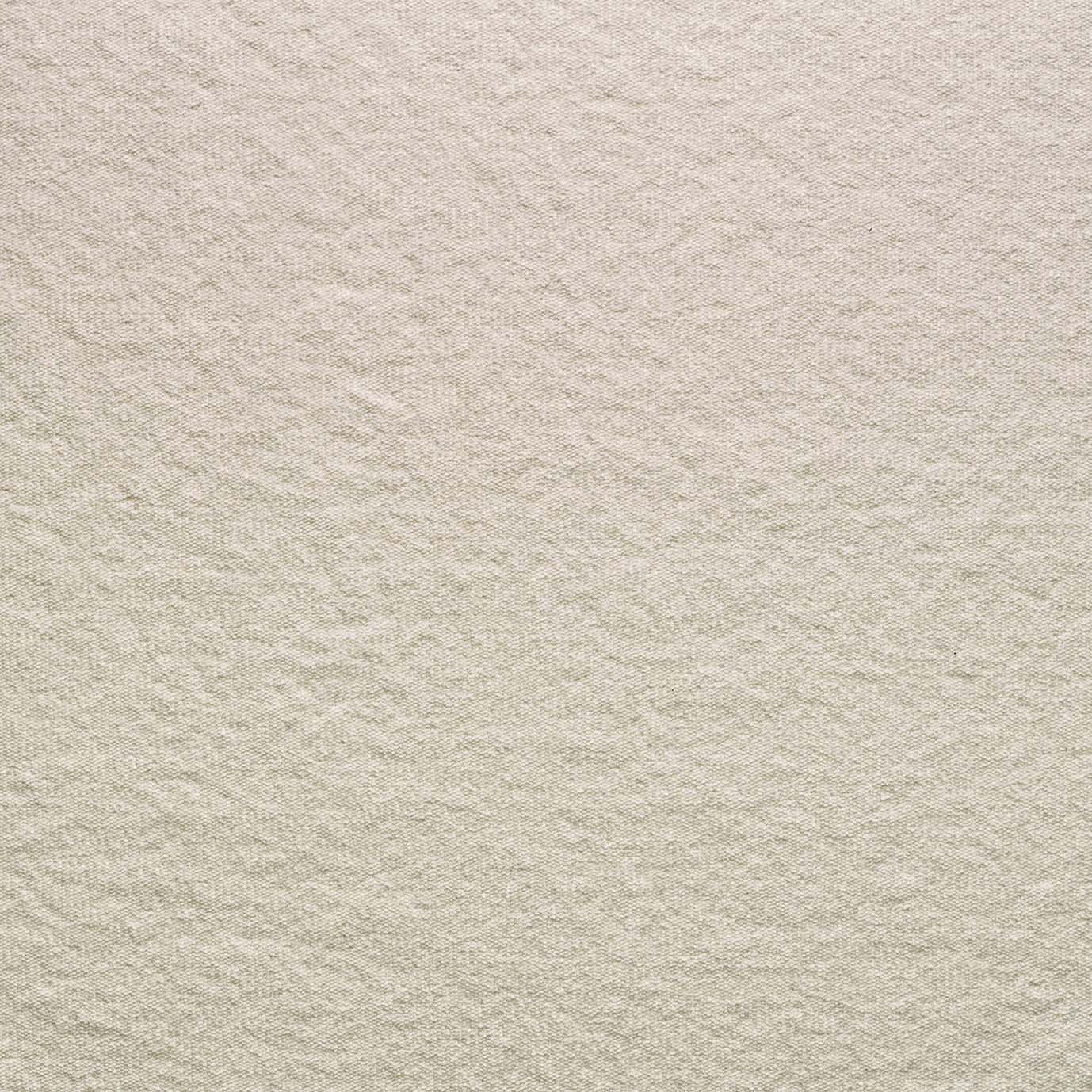 A close-up of textured, off-white paper with a grainy surface, reminiscent of Wooden Stories Fabric + Leather Swatches, evenly lit and ideal for custom made-to-order projects.