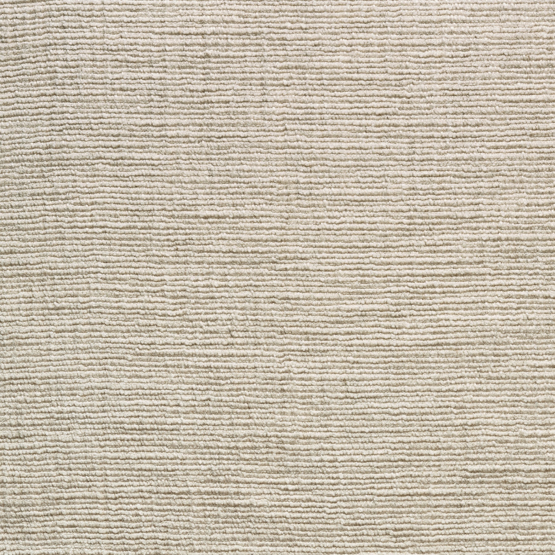 Close-up of beige Material Swatches by Natadora + Tolv, showcasing soft, textured fabric with horizontal ridges and a natural woven pattern—perfect for upholstery ideas or inspiration.