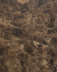 Close-up of a dark brown marble surface with lighter veins, highlighting natural patterns and texture—ideal for Material Swatches from Natadora + Tolv.